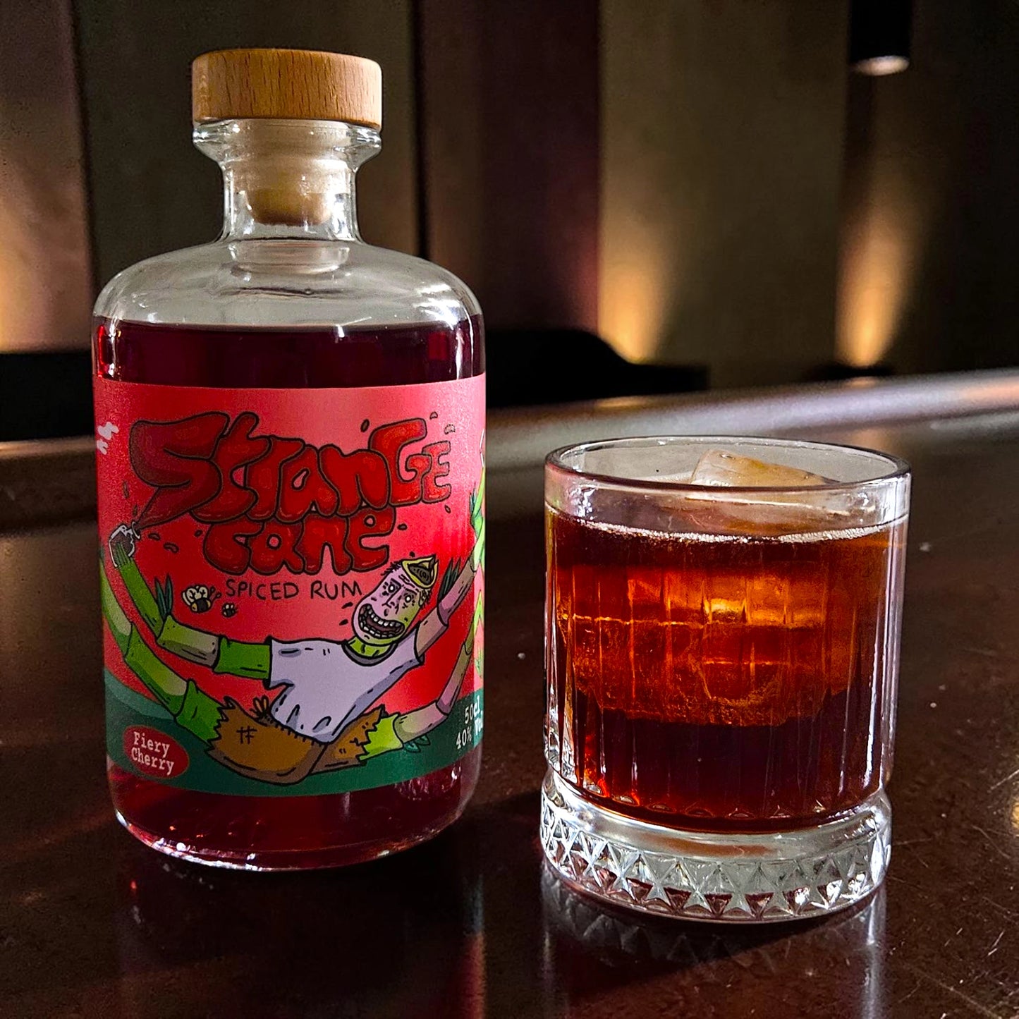 Strange Cane Fiery Cherry spiced rum with cola on ice