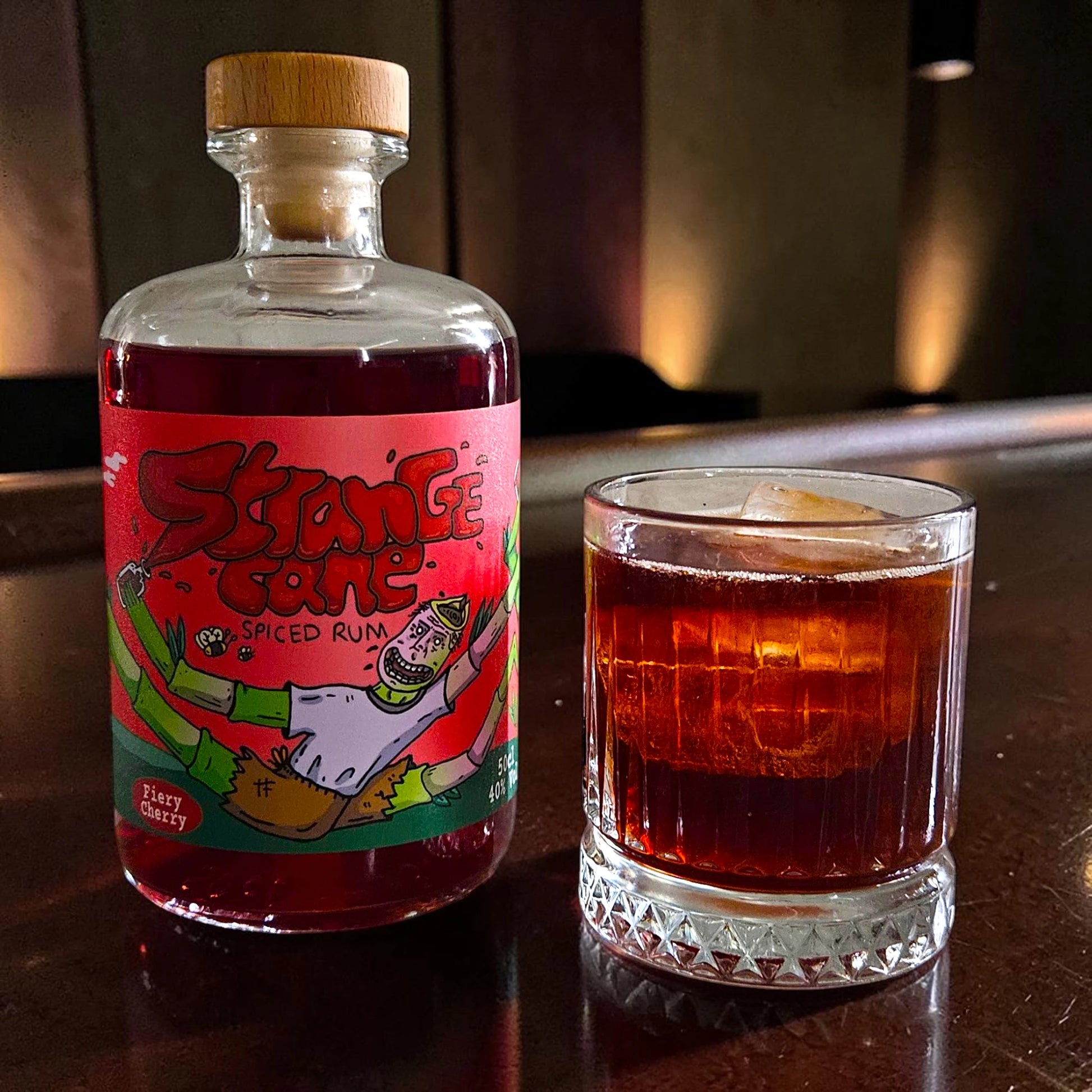 Strange Cane Fiery Cherry spiced rum with cola on ice
