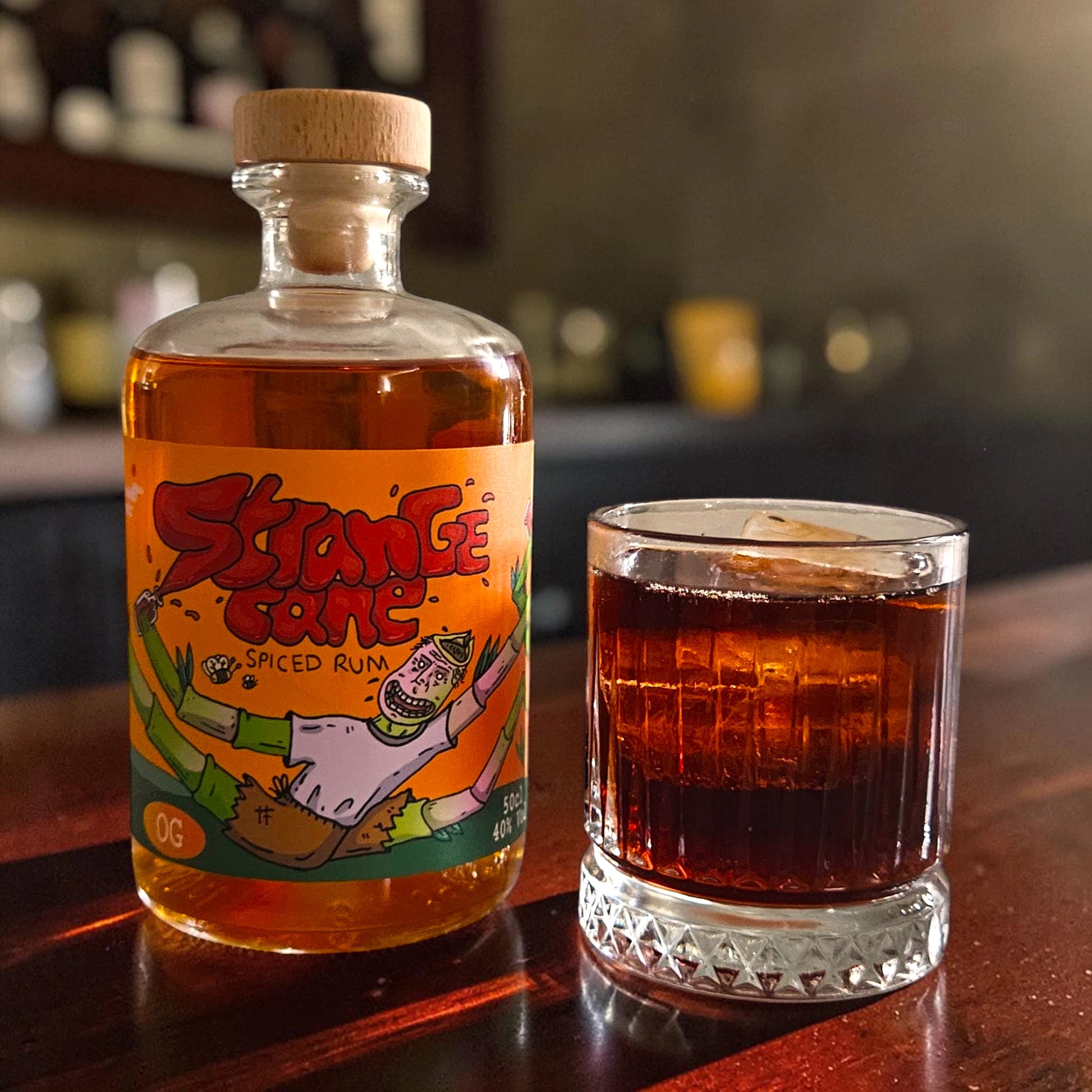Strange Cane OG spiced rum with cola on ice
