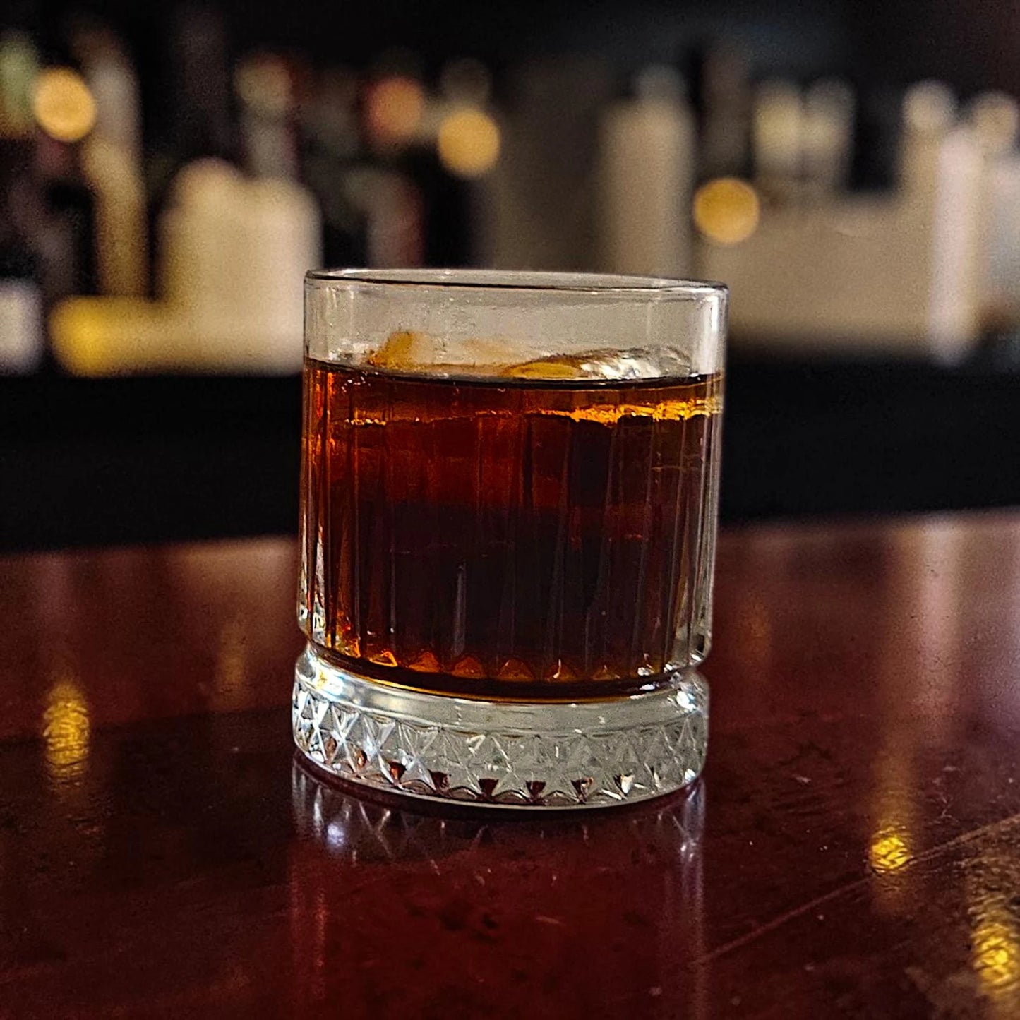 Strange Cane Spiced Biscuit spiced rum served with cola over ice