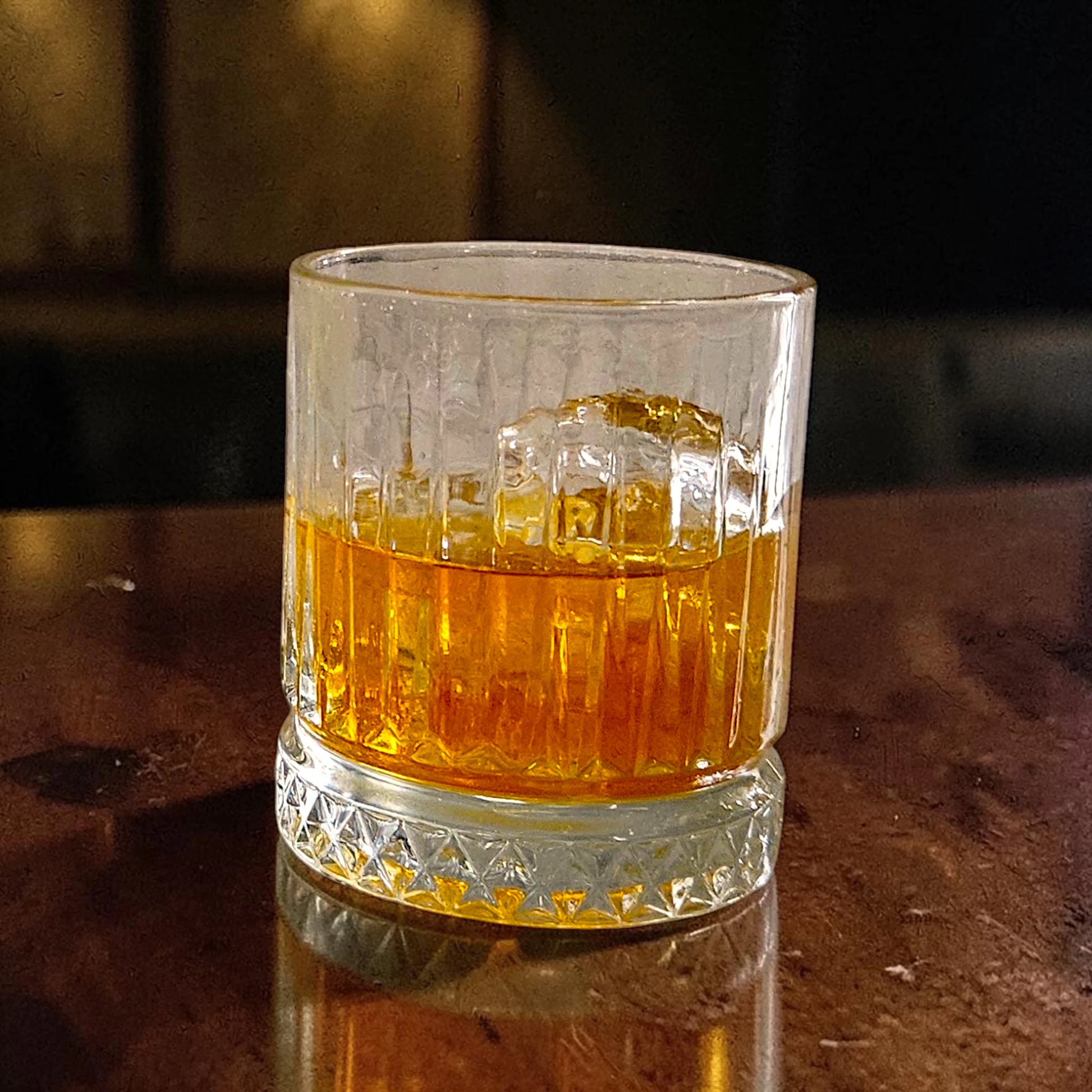 Strange Cane Spiced Biscuit spiced rum in a glass over ice
